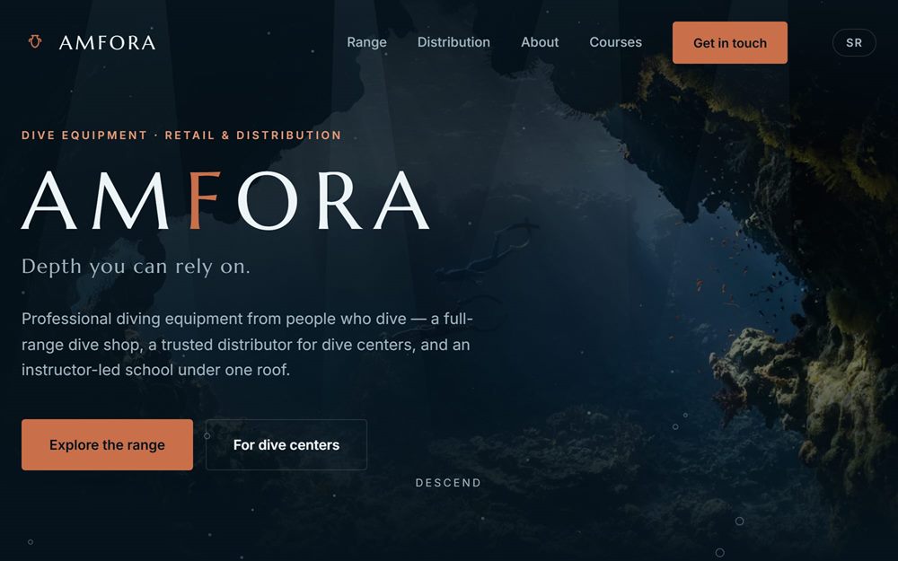The Amfora homepage: the wordmark and the line Depth you can rely on, set over a photographed underwater reef, above links to the range, distribution and courses.
